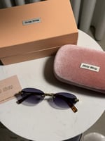 نظارة MIU MIU اطار ذهبي تايقر عدسة مدرج