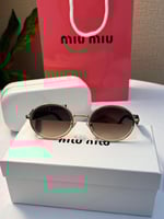 نظارة miu miu إطار بني غامق - عدسة بني مدرج