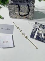 أسوارة Dior معدن ذهبي