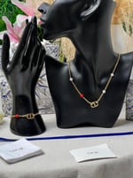 طقم Dior ذهبي