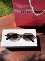 نظارة MIU MIU