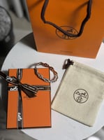 إسوارة HERMES وجهين لون فضي