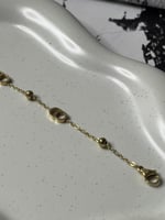 إسوارة Christian Dior ذهبي