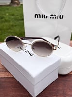 نظارة miu miu إطار بني غامق - عدسة بني مدرج