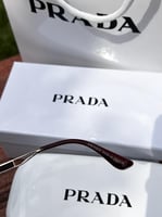 نظارة PRADA ذهبي عدسة بني
