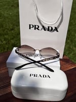 نظارة PRADA إطار أسود- عدسة بني مدرج