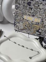 إسوارة Christian Dior فضي