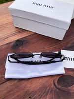 نظارة miu miu إطار أسود - عدسة اسود مدرج