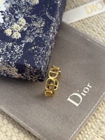 خاتم Christian Dior ذهبي .