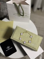 إسوارة Van cleef ذهبي - فيروزي مخطط