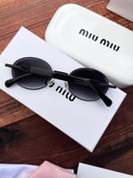 نظارة miu miu إطار أسود - عدسة اسود مدرج