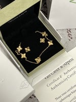 سلسال Van cleef ذهبي مع حلق