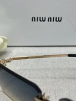 نظارة - MIU MIU