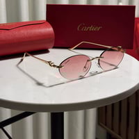 نظارة Cartier اطار ذهبي - عدسة وردي