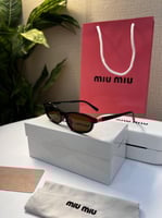 نظارة miu miu إطار اسود - عدسة بني