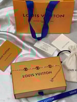 إسوارة LOUIS VUITTON معدن ذهبي صدفي