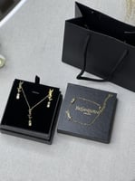 طقم سان لوران ذهبي