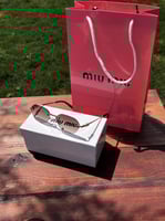 نظارة MIU MIU
