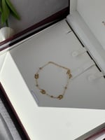 إسوارة AIGNER ذهبي