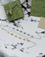 اسوارة GUCCI معدن ذهبي او فضي