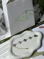 إسوارة Van cleef ذهبي -فيروزي