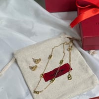 سلسال مع حلق VALENTINO