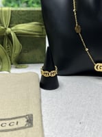 طقم GUCCI ذهبي