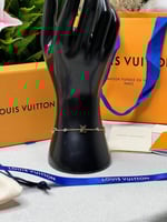 إسوارة LOUIS VUITTON معدن ذهبي