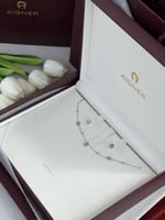 سلسال AIGNER مع حلق فضي