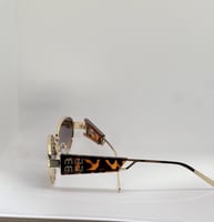 نظارة - MIU MIU اطار تايقر - عدسة بني مدرج