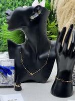 طقم Dior ذهبي