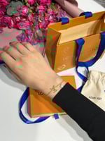 إسوارة LOUIS VUITTON معدن ذهبي