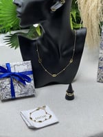 طقم Dior ذهبي