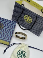 سوارة TORY BURCH مقاس 14 سم معدن ذهبي