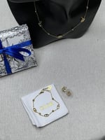 طقم Dior ذهبي