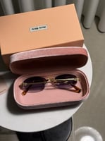 نظارة MIU MIU اطار ذهبي تايقر عدسة مدرج