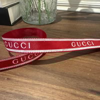 شريطة قوتشي عنابي ( متر )