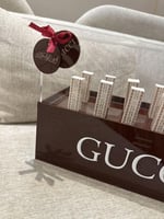 بوكس قوتشي العنابي