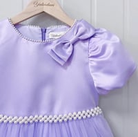 فستان موف مع اللؤلؤ الأنيق