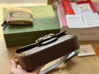 شنطة يد قوتشي