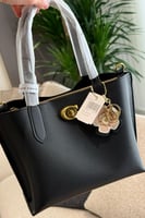 شنطة يد كوتش