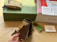 شنطة يد قوتشي