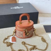 شنطة يد كوتش ميني