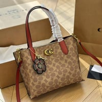 شنطة يد كوتش