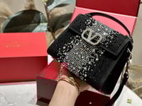 شنطة يد فالنتينو لامع