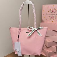 شنطة لاكوست فيس وردي