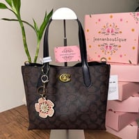 شنطة يد كوتش