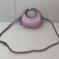 شنطة يد كوتش