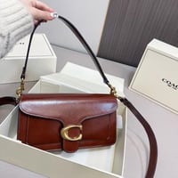 شنطة كوتش تابي لامع