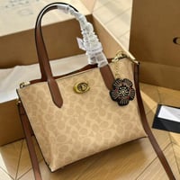 شنطة يد كوتش